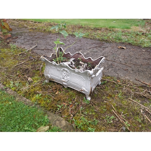 48 - 19th. C. cast iron planter. { 27cm H X 55cm W X 30cm D }.