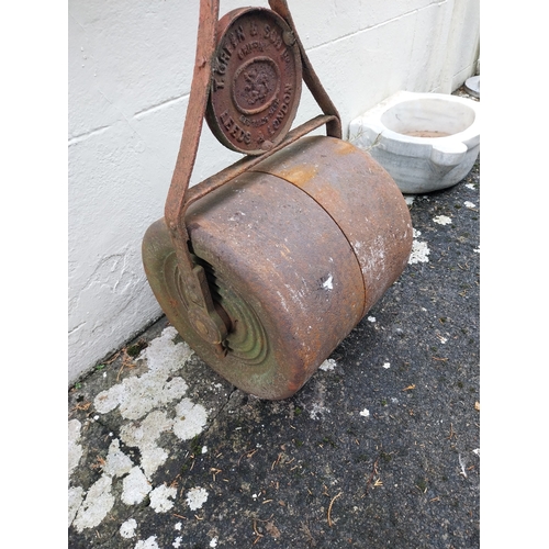 64 - Early 20th. C. cast iron garden roller. { 114cm H X 47cm W X 41cm D }.
