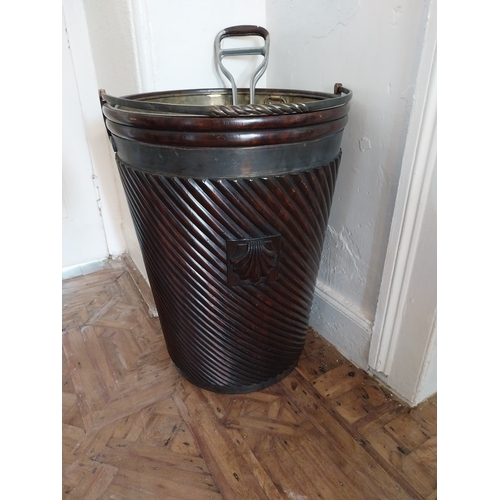 81 - Pair of Irish mahogany brass bound spiral peat buckets in the Georgian manner. { 68cm H X 50cm Dia }... 
