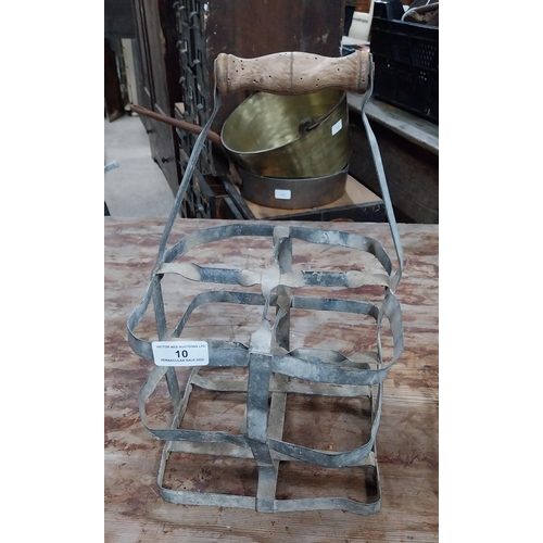 10 - Two 20th C. metal milk crates. {36 cm H x 31 cm Dia.}.