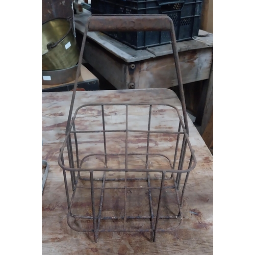 10 - Two 20th C. metal milk crates. {36 cm H x 31 cm Dia.}.
