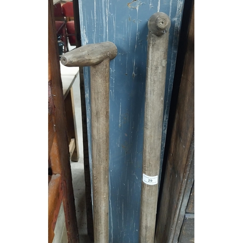 29 - Two early 20th C. turf wing slaynes.  {125 cm H x 17 cm W}.