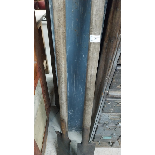 29 - Two early 20th C. turf wing slaynes.  {125 cm H x 17 cm W}.