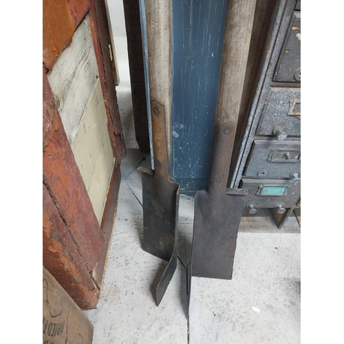 29 - Two early 20th C. turf wing slaynes.  {125 cm H x 17 cm W}.