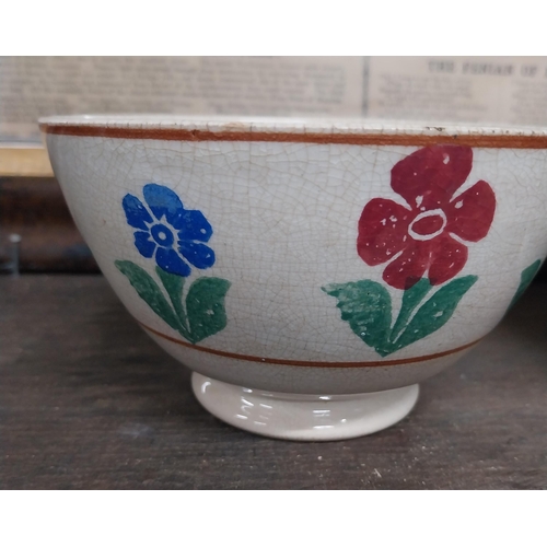 34 - Brushware and spongeware bowl and another spongeware bowl decorated with flowers. {8 cm H x 14 cm Di... 