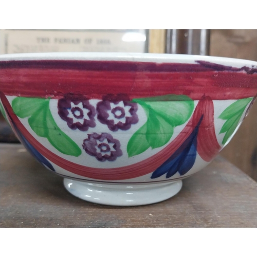 34 - Brushware and spongeware bowl and another spongeware bowl decorated with flowers. {8 cm H x 14 cm Di... 
