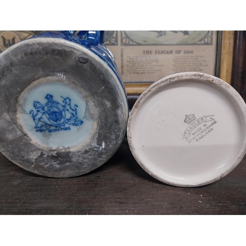 36 - Large blue and white Willow pattern mug and brown jug decorated with flowers. {14 cm H x 17 cm Dia a... 