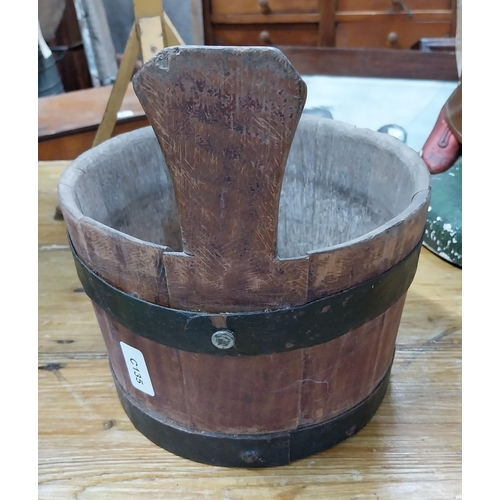 47 - 20th C. oak piggen with metal bands made by Ned Gavin Ballinagh. {27 cm H x 24 cm Dia.}.