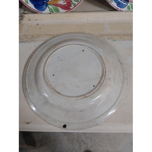 5 - 19th C. brown and white spongeware plate decorated with birds and flowers. {3 cm H x 25 cm Dia.}.