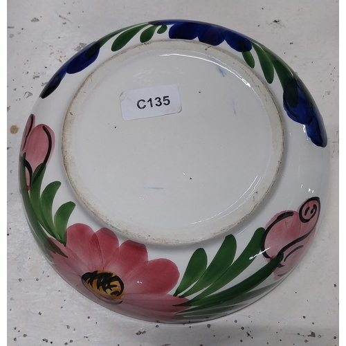 51 - 20th C. brushware dish decorated with flowers. {5 cm H x 32 cm Dia.}.