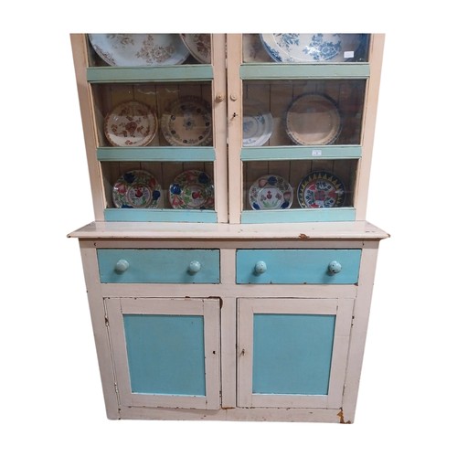 2 - Early 20th C. painted pine West of Ireland dresser with two glazed doors over two short drawers over... 