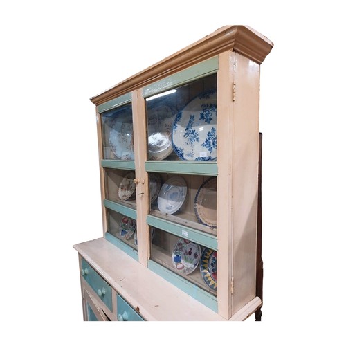 2 - Early 20th C. painted pine West of Ireland dresser with two glazed doors over two short drawers over... 