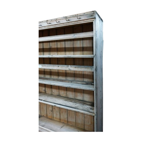 30 - Victorian stripped pine dresser with three shelves over two short drawers and two panelled doors on ... 