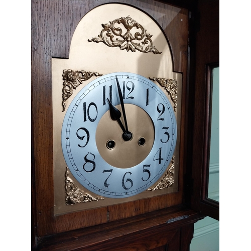 56 - 1950's oak Grandmother clock with gilded metal dial. {185 cm H x 35 cm W x 22 cm D}