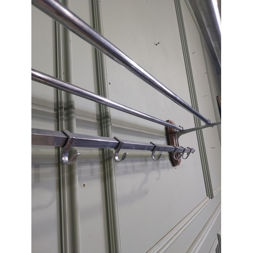 15 - Early 20th C. chrome wall mounted luggage rack. {20 cm H x 104 cm W x 30 cm D}.