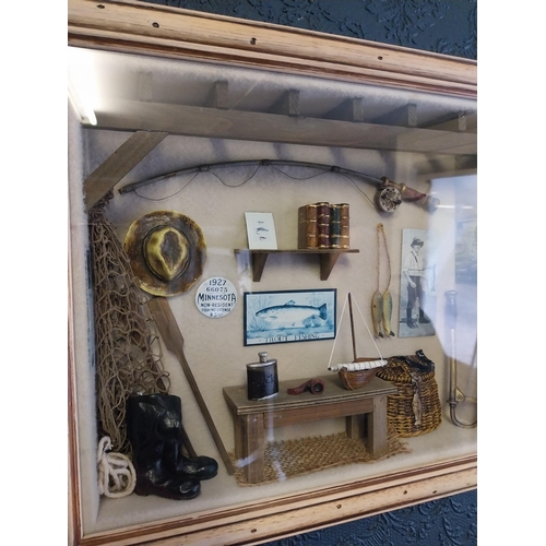 22 - Framed montage of Fishing items. {35 cm H x 40 cm W}. NOT AVAILABLE TO VIEW IN PERSON