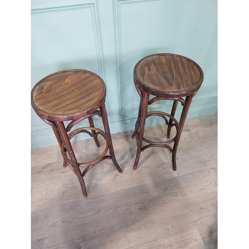 23 - Pair of bentwood high stools. [81 cm H x 36 cm Dia.}.