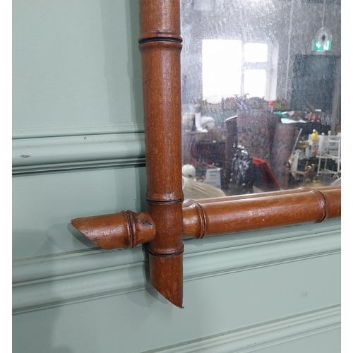 37 - Early 20th C. bamboo wall mirror. {86 cm H x 65 cm W}.