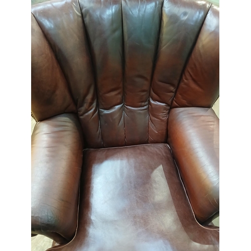 46 - Highback leather armchair on claw and ball feet in the Tetrad Oskar style. {H 100cm x W 84cm x D 84c... 