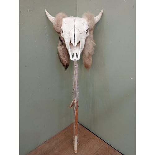 54 - Totem staff stick decorated with skull and fur.  NOT AVAILABLE TO VIEW IN PERSON
