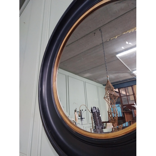 65 - Good quality ebonised and gilt circular wall mirror. {80 cm Dia.}.