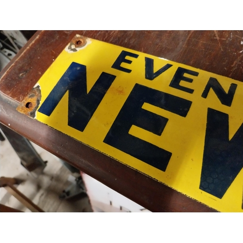 12 - Evening News enamel advertising sign. {10 cm H x 30 cm W}.