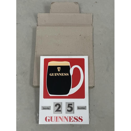 13 - 1960's tin plate Guinness calander in original box {28cm H x 22cm W}