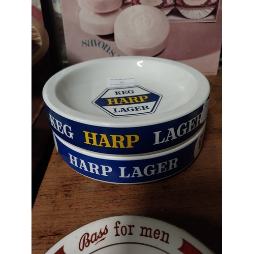 16 - Two Bristol Pottery Harp Lager ceramic ashtrays. {4 cm H x 15 cm Dia].