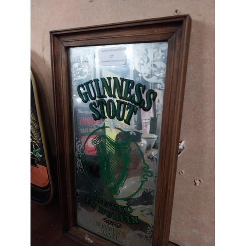 27 - Guinness Stout Brewed in Dublin advertising mirror. {34 cm H x 18 cm D}.