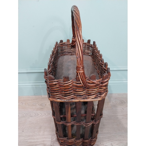 36 - Early 20th C. wicker wine rack and picnic basket. {70 cm H x 44 cm W x 24 cm D}.