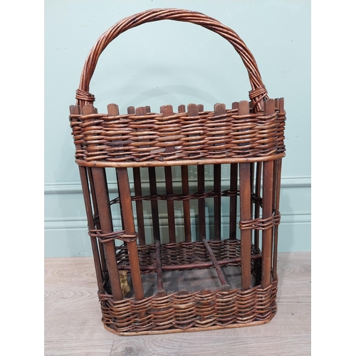 36 - Early 20th C. wicker wine rack and picnic basket. {70 cm H x 44 cm W x 24 cm D}.