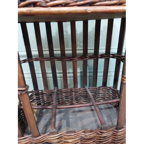 36 - Early 20th C. wicker wine rack and picnic basket. {70 cm H x 44 cm W x 24 cm D}.