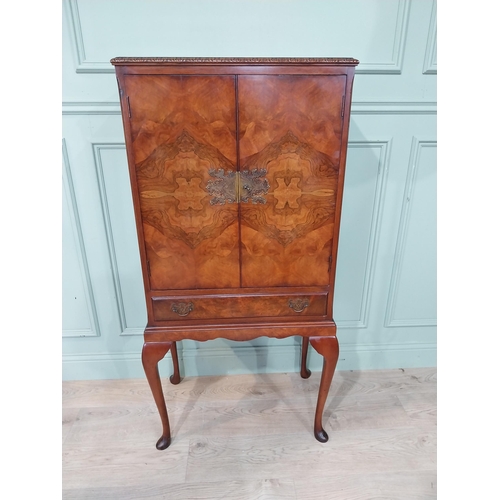 57 - Exceptional quality 1950's burr walnut drink's cabinet on cabriole legs. {132 cm h x 65 cm W x 43 cm... 