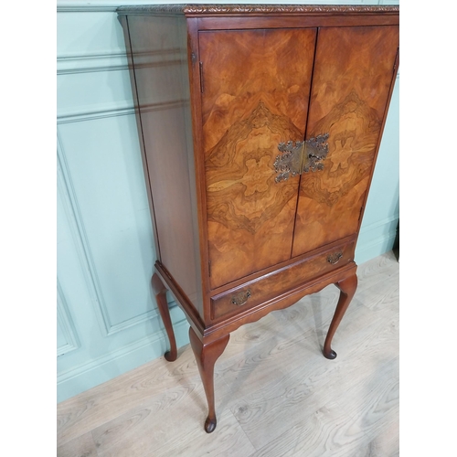 57 - Exceptional quality 1950's burr walnut drink's cabinet on cabriole legs. {132 cm h x 65 cm W x 43 cm... 