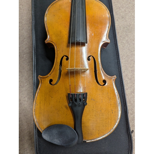 38 - German violin maker Antonius Stradivarius Cremonensis with case {62cm L x 21cm W x 4cm D}
