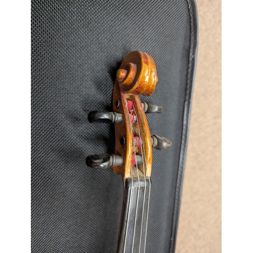 38 - German violin maker Antonius Stradivarius Cremonensis with case {62cm L x 21cm W x 4cm D}
