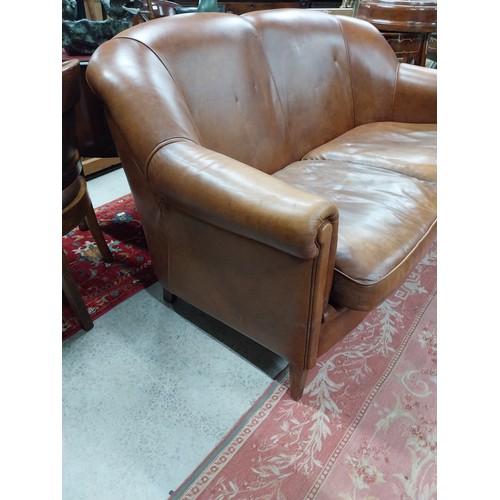 51 - Good quality hand dyed French leather upholstered two seater sofa on tapered mahogany legs. {82 cm H... 