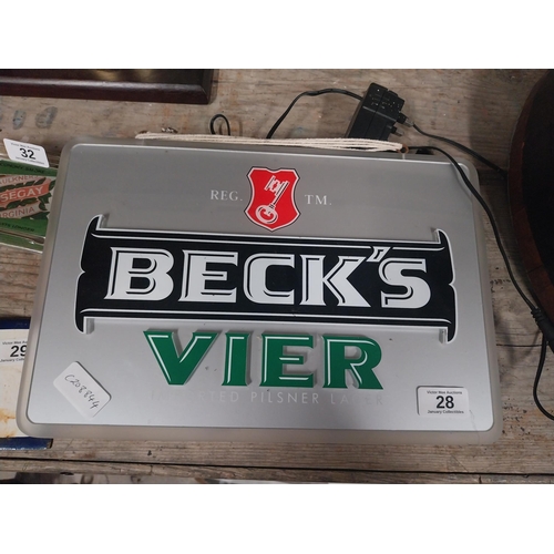28 - 1990's Beck's Vier Imported Lager light up counter font. {24 H x 25 cm Dia}.