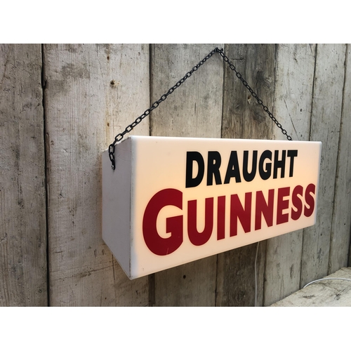 35 - Draught Guinness light up box featuring the 1934 John Gilroy font  up box { 28cm H x 70cm W x 10cm D... 