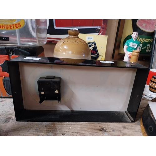 Guinness perspex battery operated clock. {18 cm H x 35 cm W x 7 cm D}.