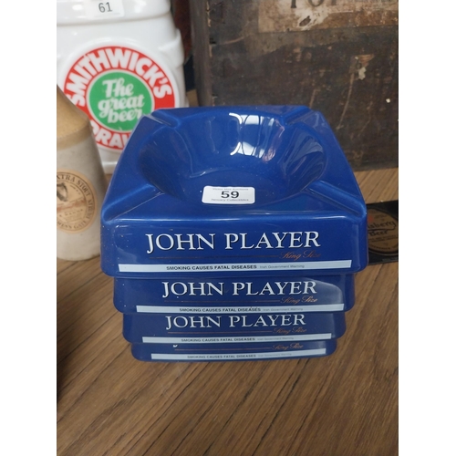 59 - Four John Player's Wade ceramic advertising ashtrays. {4 cm H x 15 cm Dia.}.