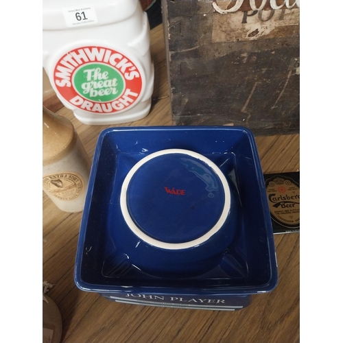 59 - Four John Player's Wade ceramic advertising ashtrays. {4 cm H x 15 cm Dia.}.