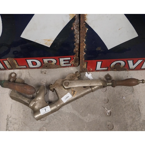 7 - Three early 19th C. brass and chrome cork pullers. {56 cm H x 7 cm W} approx.