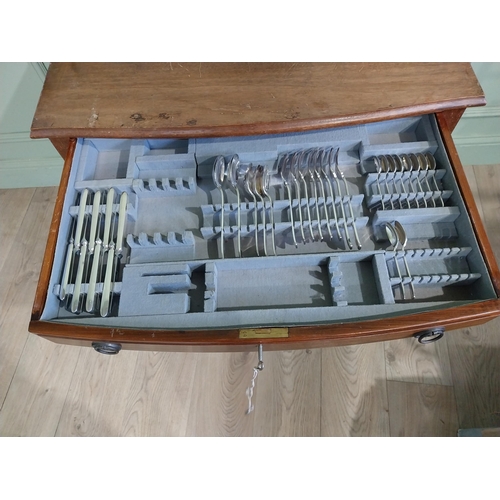 23 - 20th C. table canteen of cutlery on cabriole legs. {75 cm H x 74 cm W x 50 cm D}.
