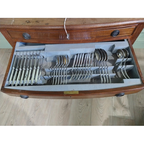 23 - 20th C. table canteen of cutlery on cabriole legs. {75 cm H x 74 cm W x 50 cm D}.