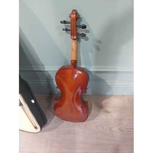 62 - Violin in case.