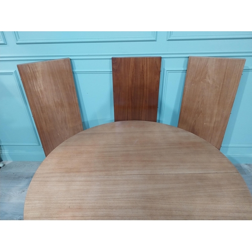 127 - Mid century dining table on square tapered legs. {73 cm H x 240 cm Dia} fully extended and {73 cm H ... 