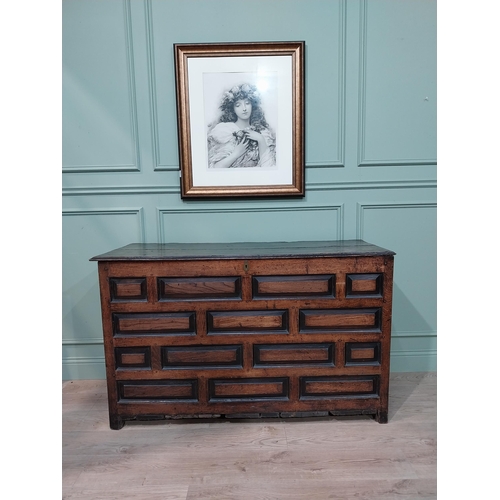 65 - 18th C. oak coffer with panelled front and sides. {86 cm H x 143 cm W x 56 cm D}.