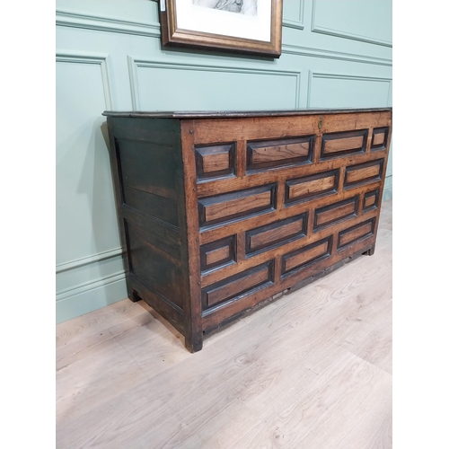 65 - 18th C. oak coffer with panelled front and sides. {86 cm H x 143 cm W x 56 cm D}.
