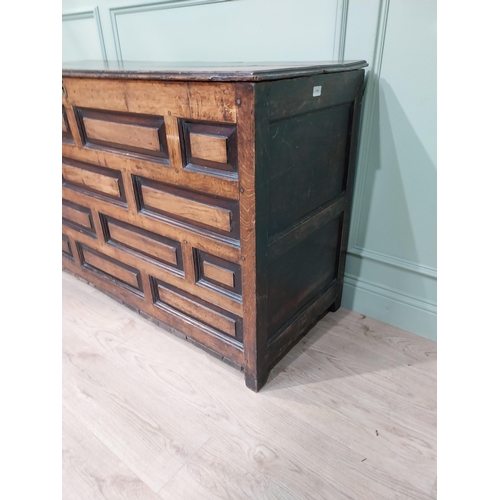 65 - 18th C. oak coffer with panelled front and sides. {86 cm H x 143 cm W x 56 cm D}.